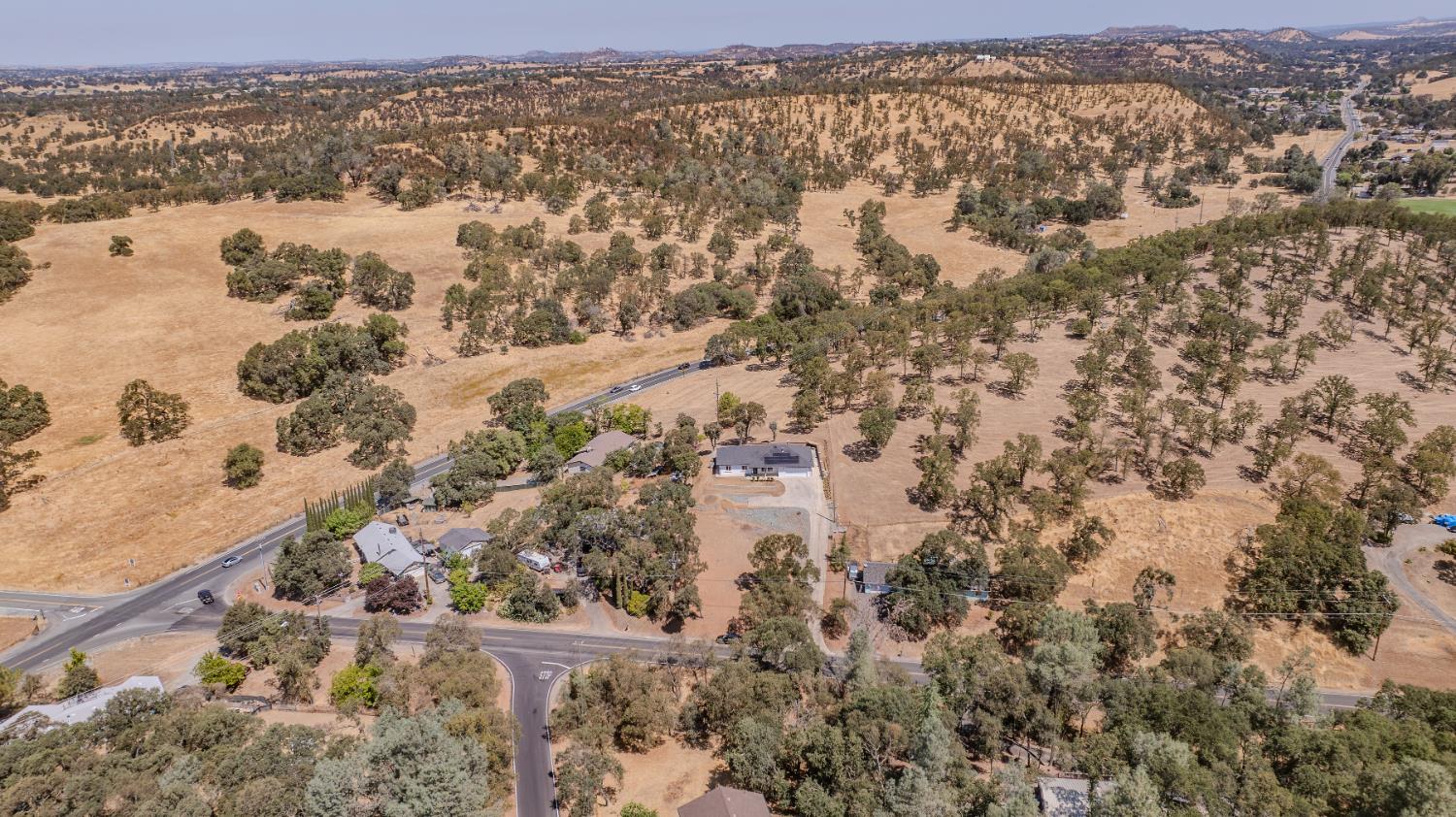 5939 Garner Place Valley Springs, CA 95252 - Photo 34 of 40 an aerial view of residential houses with outdoor space