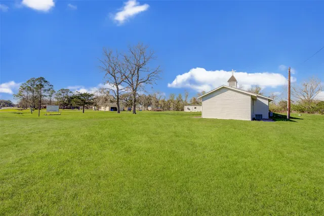 a view of a kitchen with furniture and a fireplace