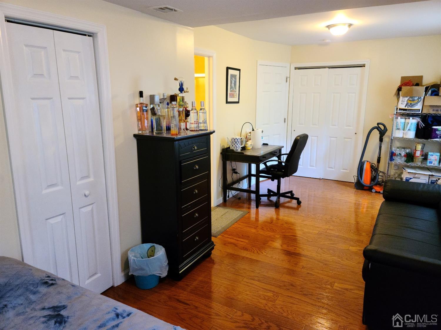 2 East Knollwood Road Edison, NJ 08817 - Photo 15 of 22 a view of a dining room with furniture and a chandelier