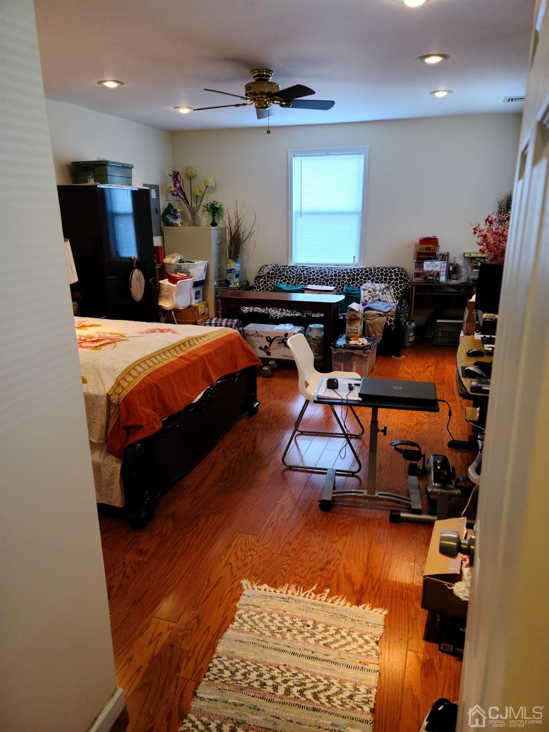 2 East Knollwood Road Edison, NJ 08817 - Photo 16 of 22 a living room with furniture pool table and a mirror