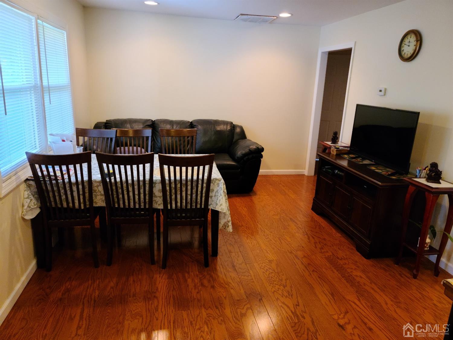 2 East Knollwood Road Edison, NJ 08817 - Photo 3 of 22 a view of a livingroom with furniture and wooden floor