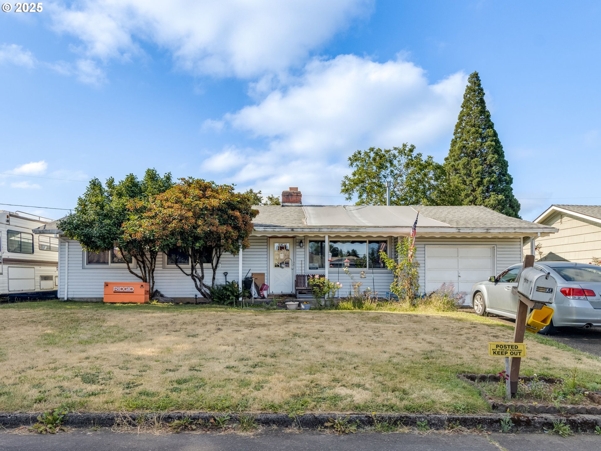 18010 Southeast Stephens Street Portland, OR 97233 - Photo 1 of 30 a view of a house with a yard and sitting area