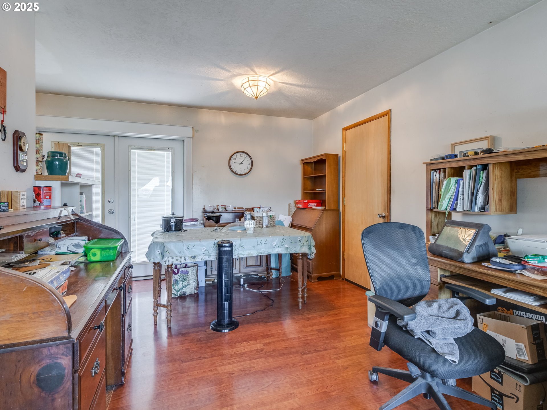 18010 Southeast Stephens Street Portland, OR 97233 - Photo 12 of 30 a living room with furniture and wooden floor