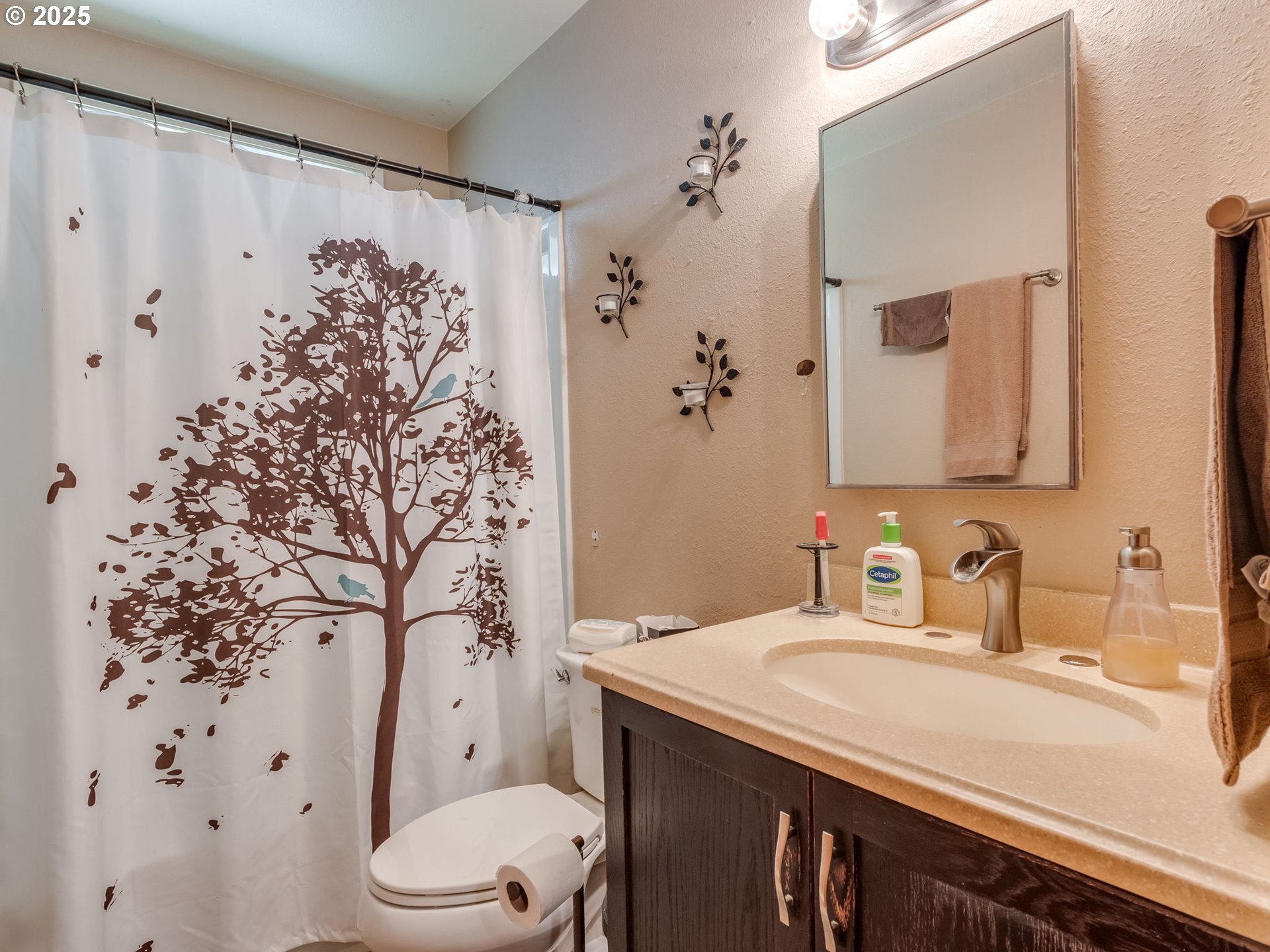 18010 Southeast Stephens Street Portland, OR 97233 - Photo 18 of 30 a bathroom with a sink toilet and shower