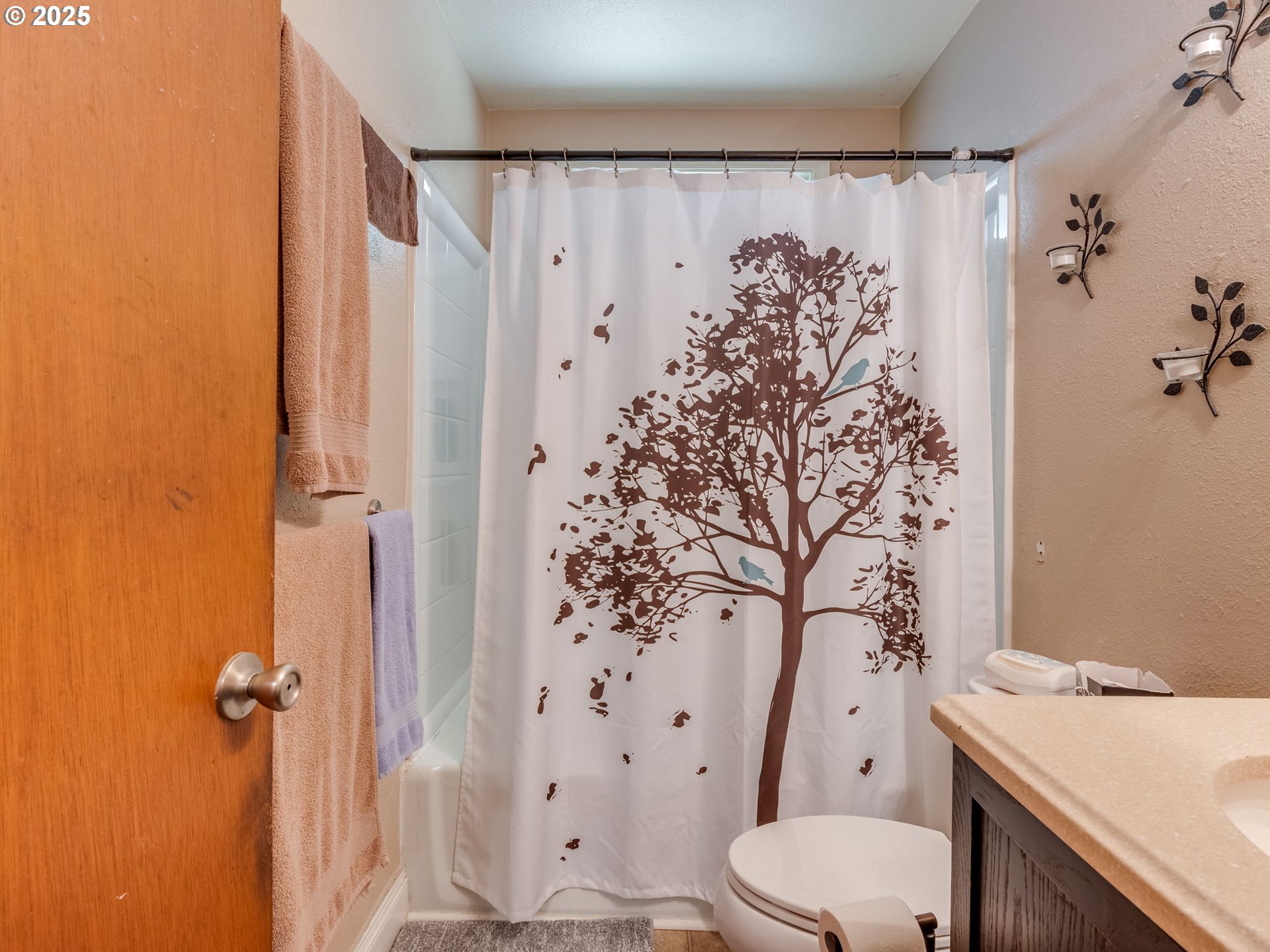 18010 Southeast Stephens Street Portland, OR 97233 - Photo 19 of 30 a bathroom with a sink toilet and shower