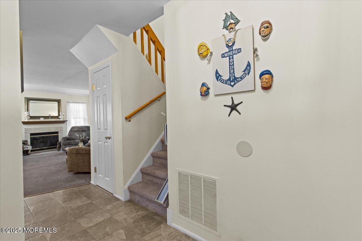 a view of hallway with a window