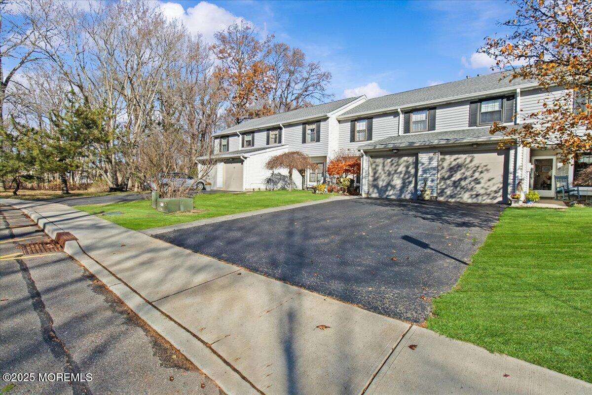 94 Paddock Court Oceanport, NJ 07757 - Photo 12 of 38 a view of a house with a yard and pathway