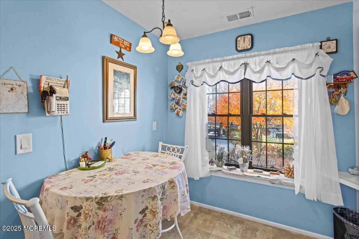 94 Paddock Court Oceanport, NJ 07757 - Photo 22 of 38 a bedroom with a bed mirror and a window