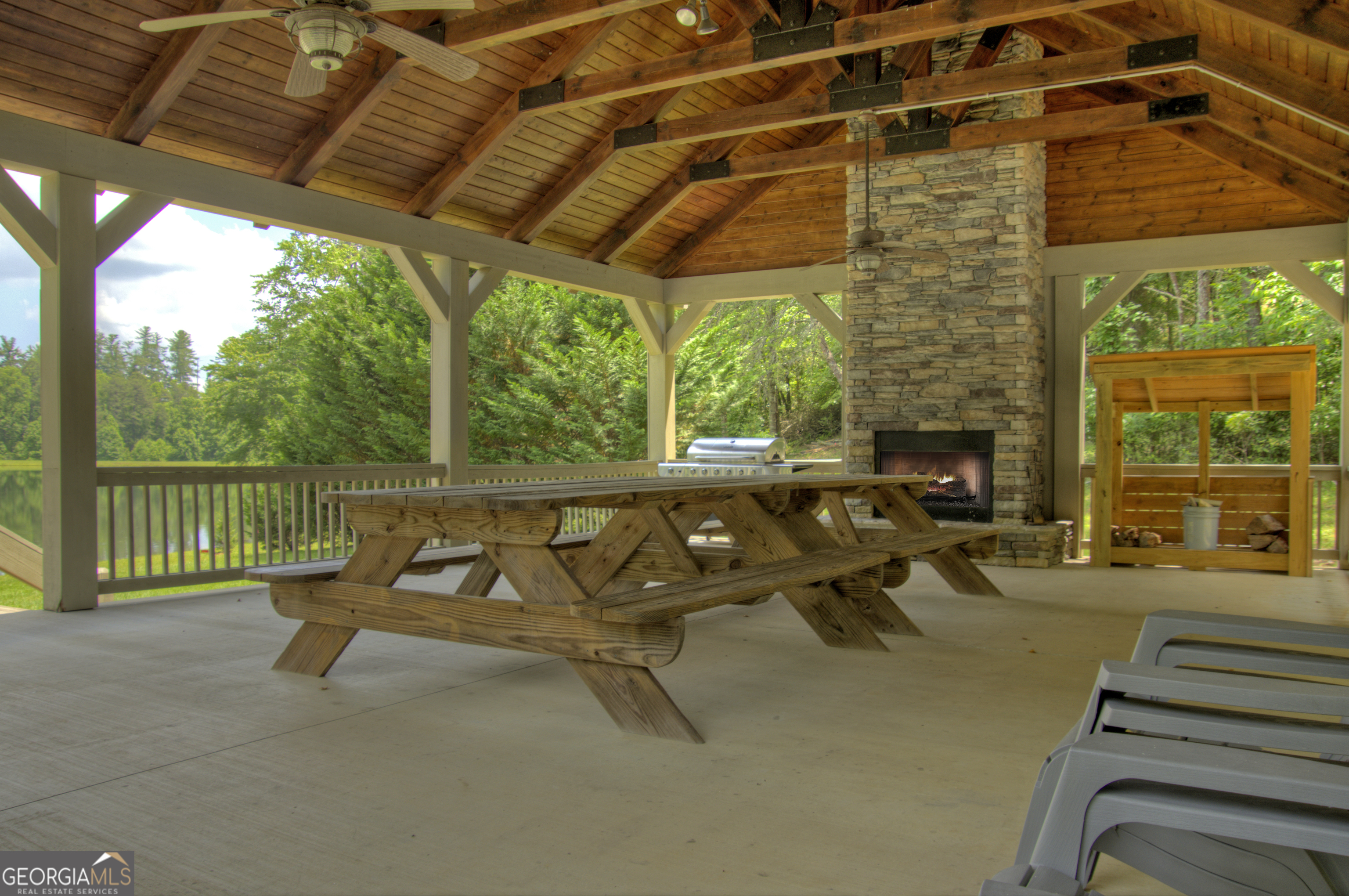 Lot 132 Fox Cove Road, Unit 132 Blairsville, GA 30512 - Photo 39 of 41 a view of a patio with a table and chairs