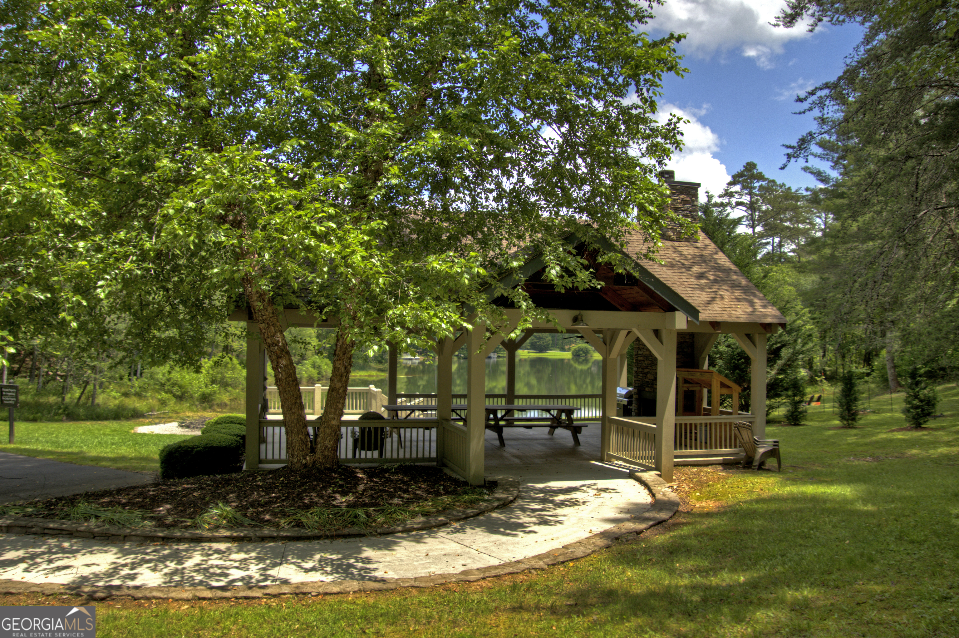 Lot 132 Fox Cove Road, Unit 132 Blairsville, GA 30512 - Photo 40 of 41 a view of a house with backyard swimming pool and sitting area
