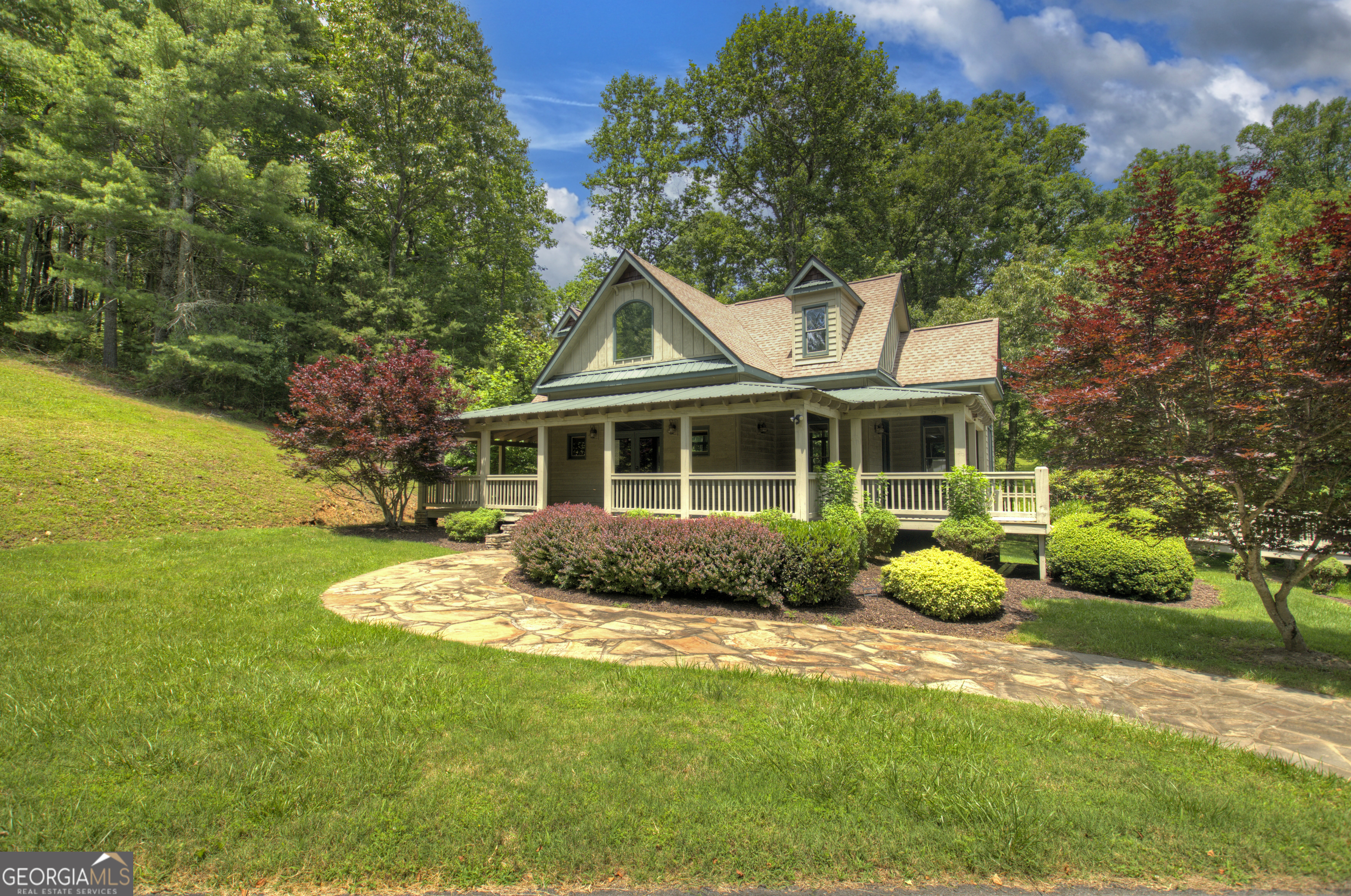 Lot 132 Fox Cove Road, Unit 132 Blairsville, GA 30512 - Photo 41 of 41 a front view of a house with a garden