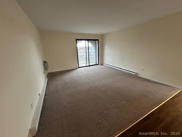 43 A Seaview Avenue, Unit 12 Stamford, CT 06902 - Photo 2 of 10 an empty room with windows