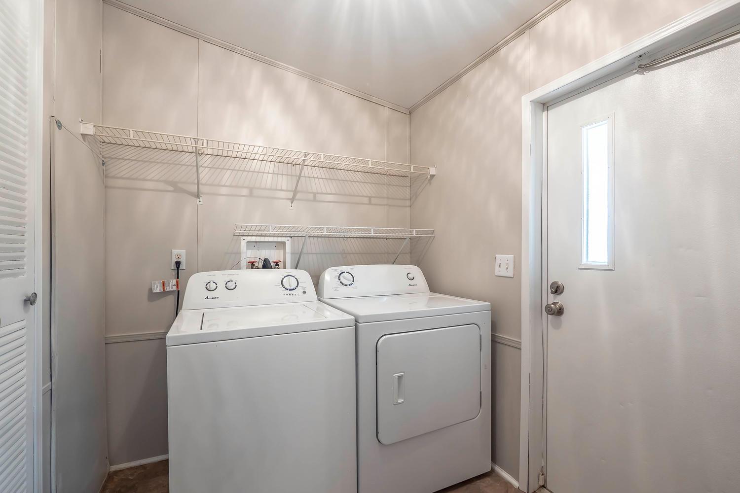 2634 Round Hill Road Lewisburg, TN 37091 - Photo 10 of 16 Laundry room with lots of shelving for storage