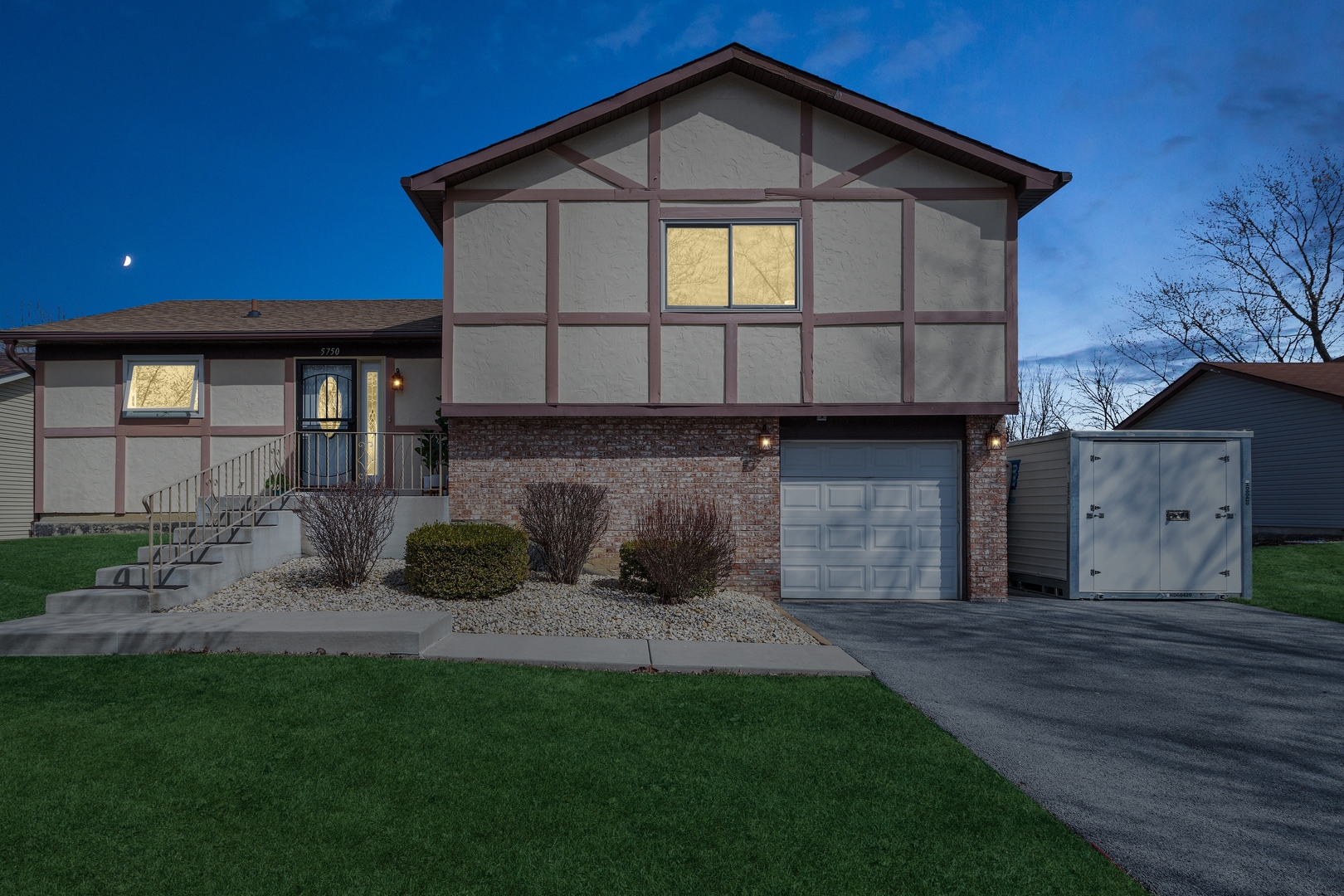 5750 Timberlane Road Matteson, IL 60443 - Photo 2 of 15 a view of a house with a yard