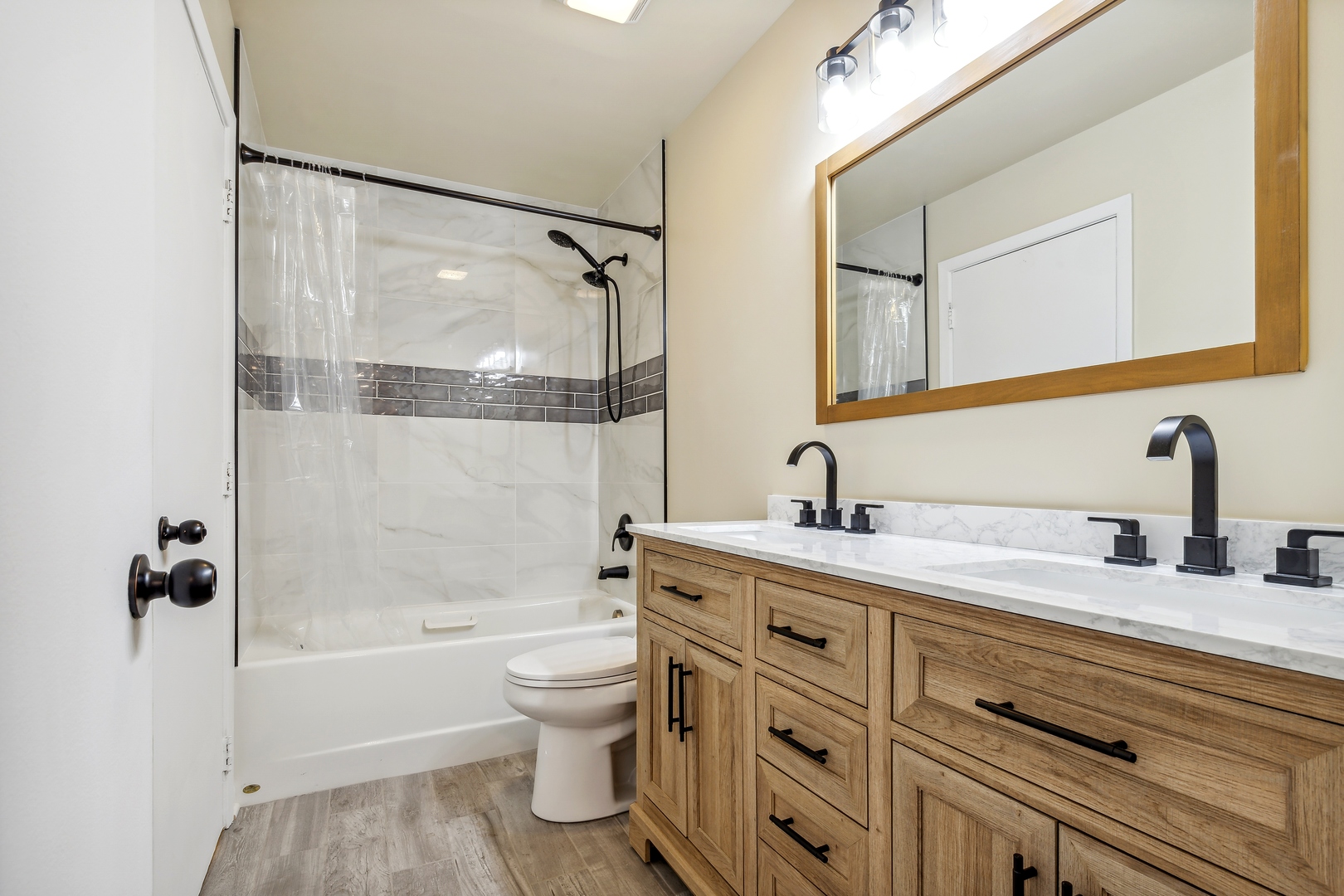 5750 Timberlane Road Matteson, IL 60443 - Photo 7 of 15 a bathroom with a granite countertop sink toilet and shower