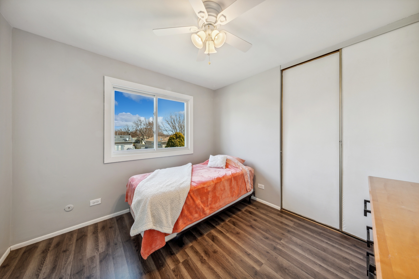 5750 Timberlane Road Matteson, IL 60443 - Photo 10 of 15 a bed sitting in a bedroom next to a window
