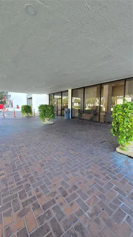 a view of a house with a yard and garage