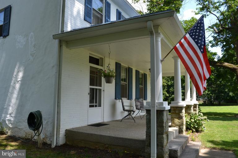 1009 Calvert Road Rising Sun, MD 21911 - Photo 2 of 30 Bring your rocking chair to relax on front porch