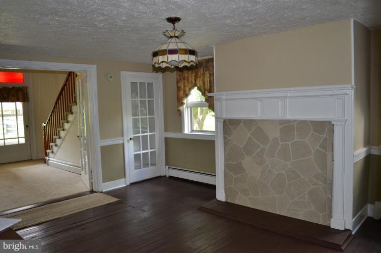 1009 Calvert Road Rising Sun, MD 21911 - Photo 11 of 30 Dining Room w/china closet & closed fireplace