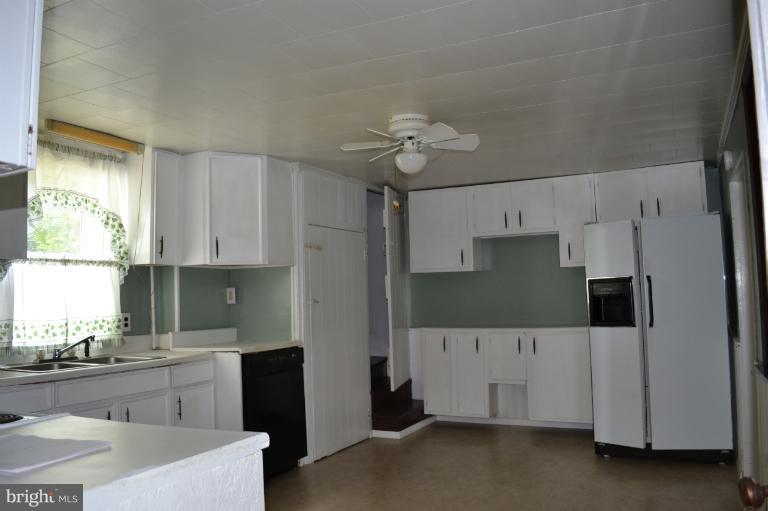 1009 Calvert Road Rising Sun, MD 21911 - Photo 8 of 30 Spacious Kitchen w/ Back staircase & bsmt access