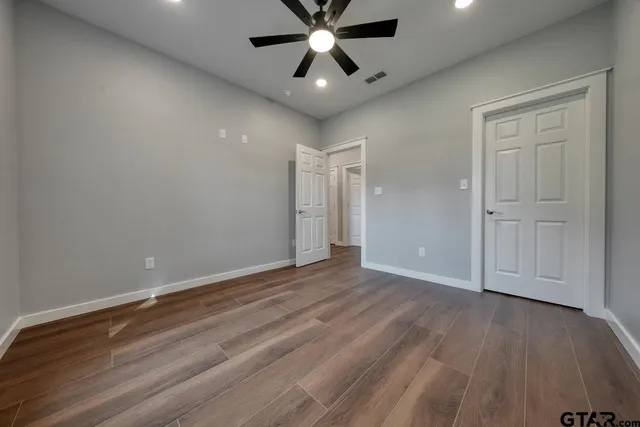 a view of an empty walk in closet