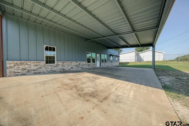 a view of a house with a patio