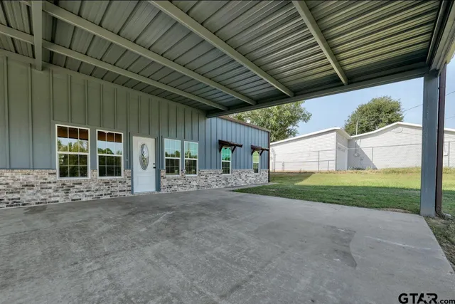 a view of a house with a big yard