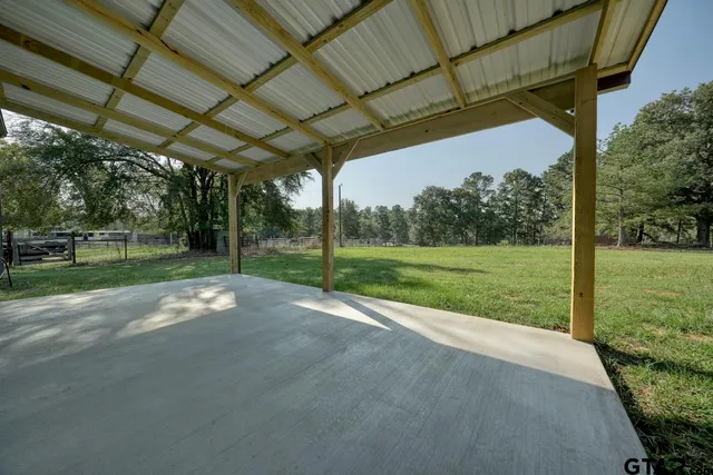 a view of a porch with garden area