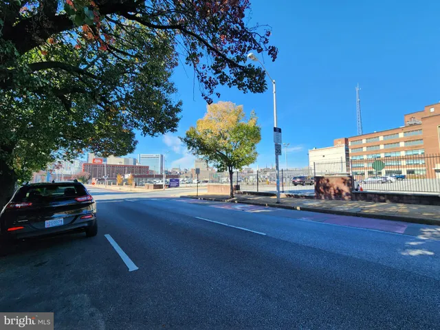 a view of a city street from a building