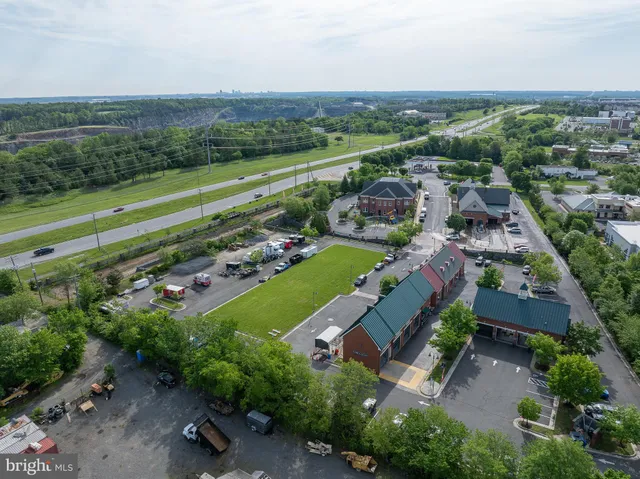 an aerial view of a house with a garden
