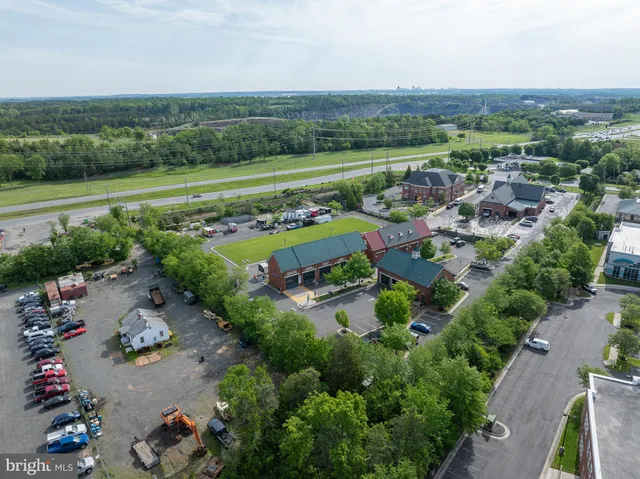 an aerial view of a house with a garden