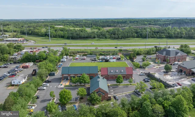an aerial view of a house with a garden