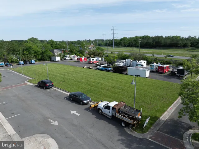 a view of a lake with a yard