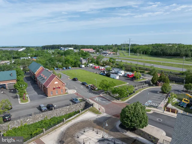 an aerial view of a house with outdoor space