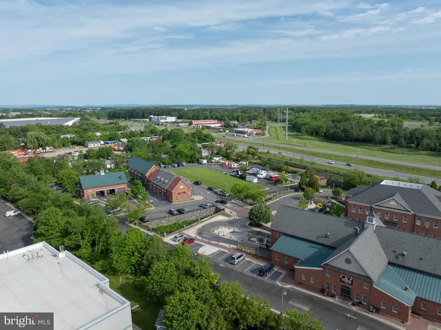 an aerial view of a house with a garden