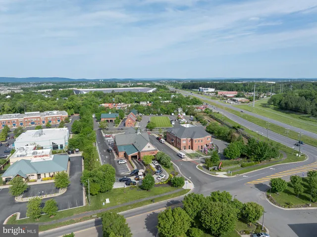 an aerial view of residential house with outdoor space