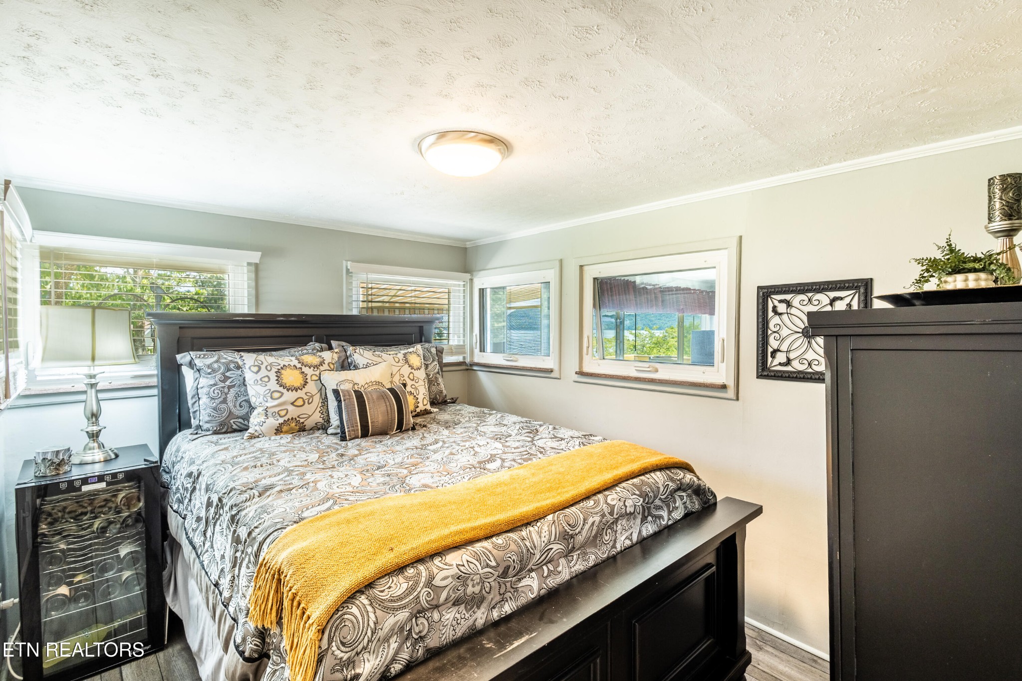 1595 Wa Ni Village Road Rutledge, TN 37861 - Photo 8 of 23 a bedroom with a bed and wooden floor