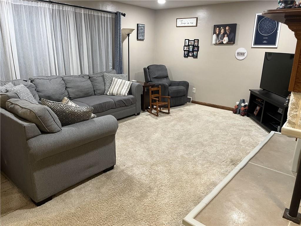 840 South Keel Ridge Road Hermitage, PA 16148 - Photo 8 of 19 a living room with furniture and a flat screen tv