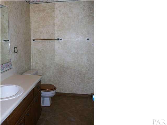 6640 Bellview Pines Road Pensacola, FL 32526 - Photo 10 of 22 Hall Bath has tile flooring