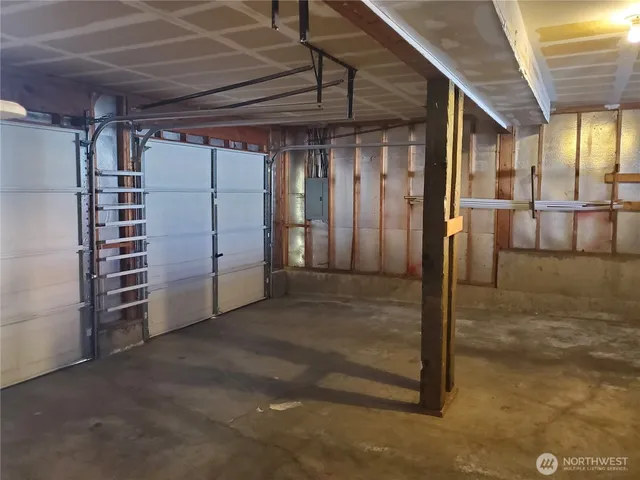 a view of a wooden fence and trees