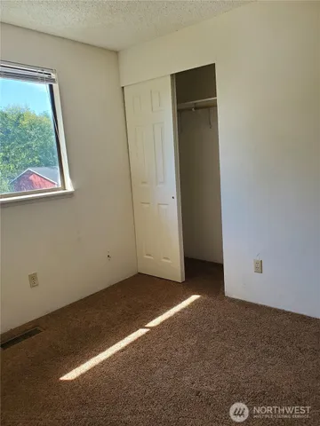 an empty room with window