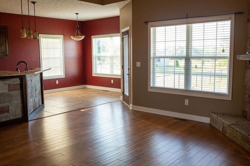 1150 Payne Road Portland, TN 37148 - Photo 18 of 59 a view of empty room with wooden floor and fan