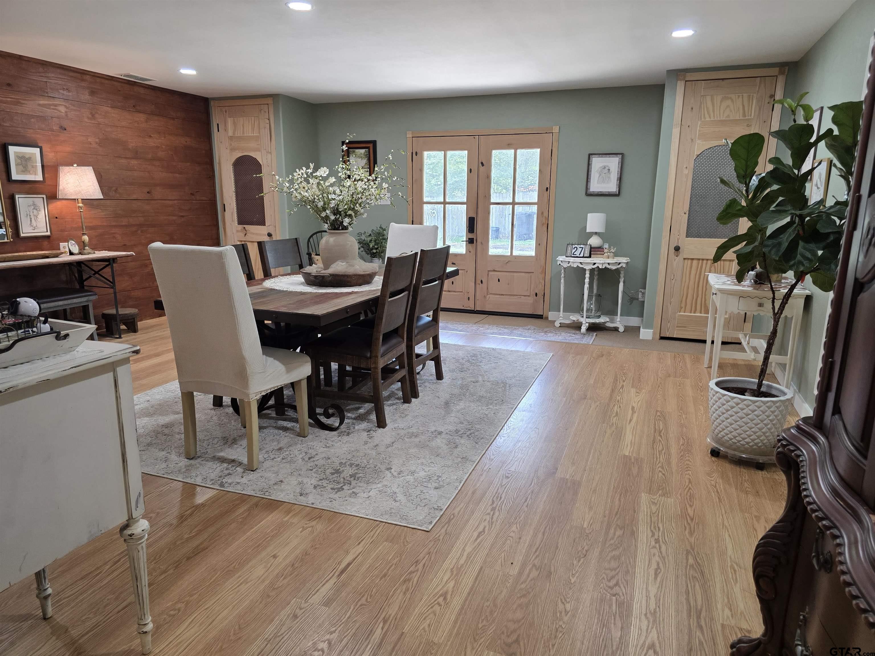 6170 Highway 271 Mount Pleasant, TX 75455 - Photo 10 of 43 a view of a dining room with furniture and a potted plant