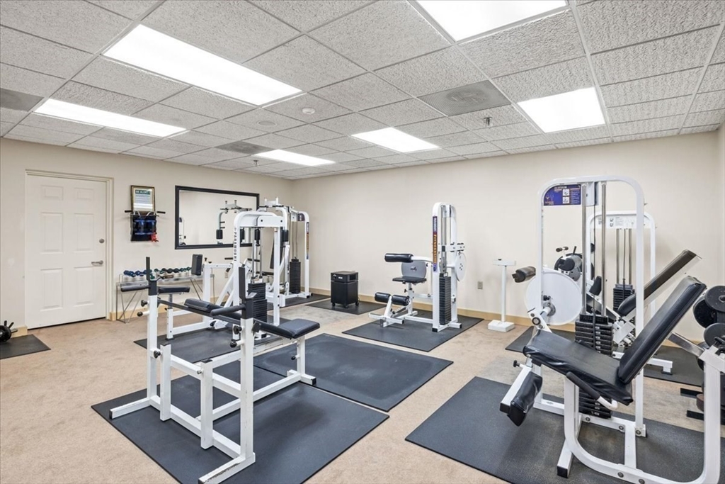 155 George Washington Boulevard, Unit 707 Hull, MA 02045 - Photo 21 of 24 a view of a room with gym equipment