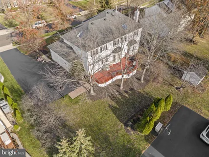 a aerial view of a house with a yard