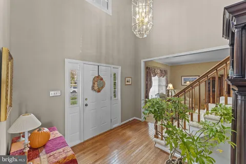 a view of entryway with wooden floor