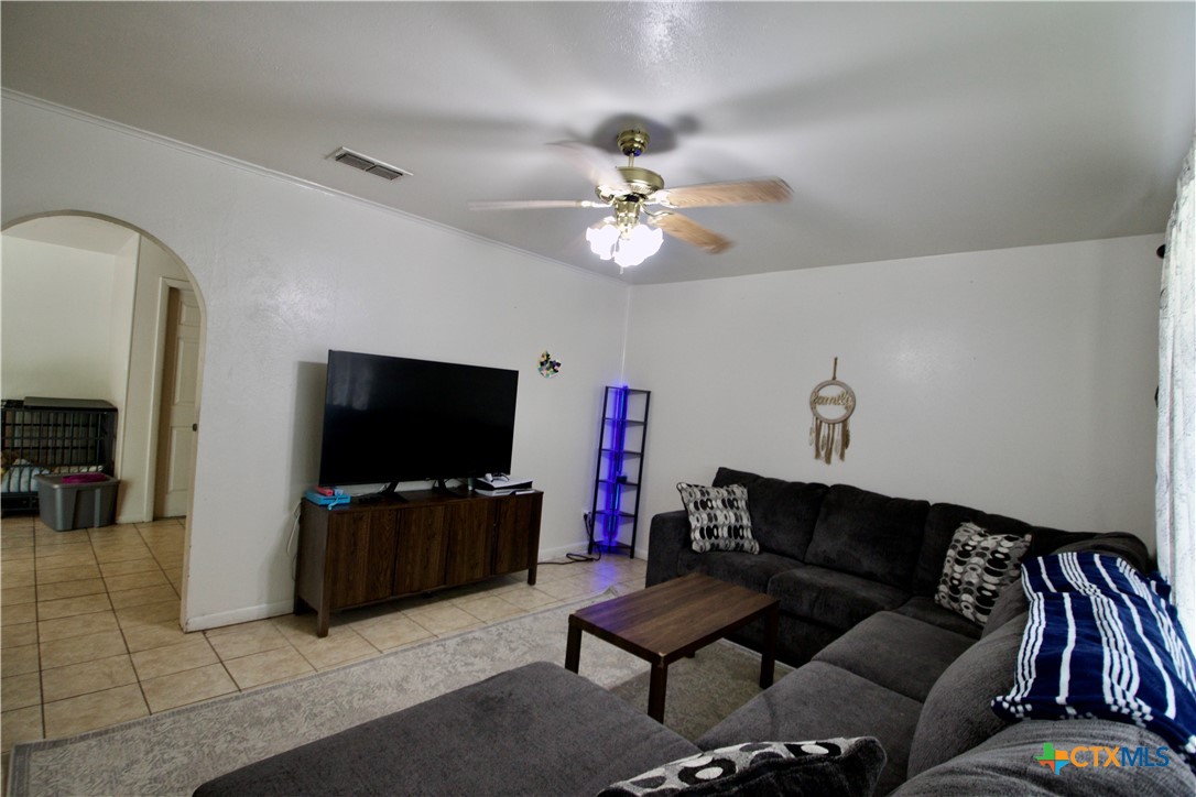 1411 West Lane Killeen, TX 76549 - Photo 12 of 36 a living room with furniture and a flat screen tv