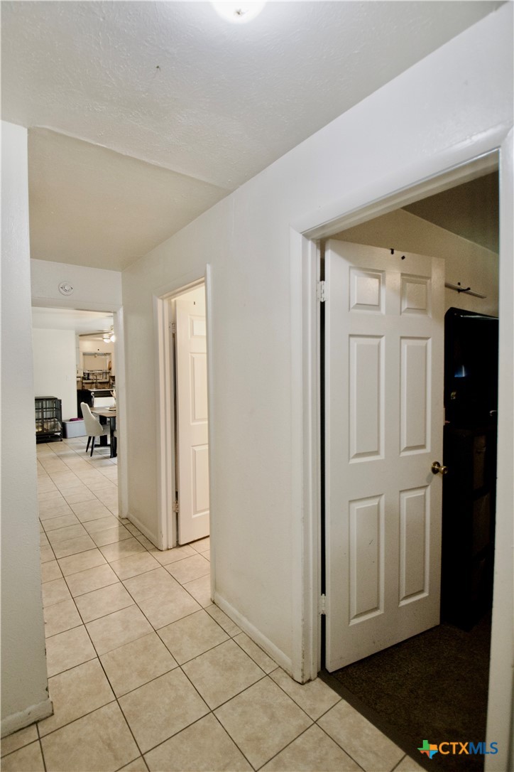 1411 West Lane Killeen, TX 76549 - Photo 16 of 36 a view of a livingroom with wooden floor and a cabinet