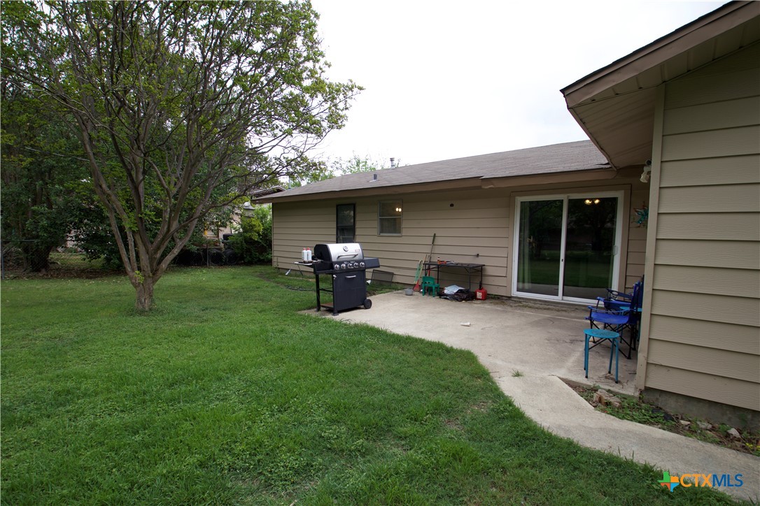 1411 West Lane Killeen, TX 76549 - Photo 24 of 36 a front view of house with yard and outdoor seating