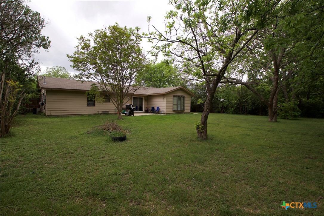 1411 West Lane Killeen, TX 76549 - Photo 31 of 36 a front view of a house with garden